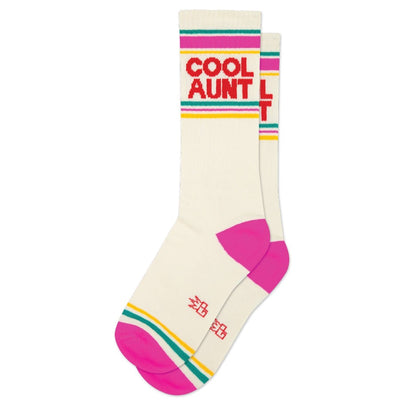 Gumball Poodle’s Cool Aunt Gym Crew Socks feature pink toes and heels, colorful top stripes, and red “COOL AUNT” text—these unisex socks bring playful charm to any outfit.