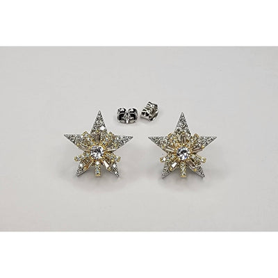BETTYOH INCs Gold And Silver Star Post Earrings feature star-shaped studs in gold and silver tones, adorned with cubic zirconia crystals and a central gem, shown on a plain white background.