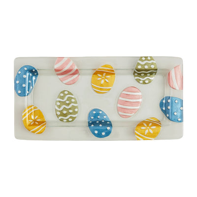 multicolor easter eggs on glass tray