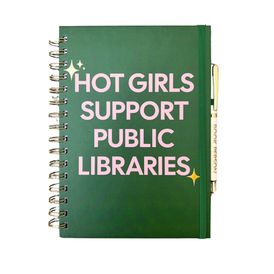 The Hot Girls Support Public Libraries Journal by FUN CLUB is an A5 green spiral notebook with pink cover text and a BOOK PERSON ballpoint pen attached to the hard cover.