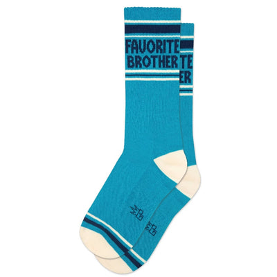 Gumball Poodles Favorite Brother Gym Crew Socks are unisex, made from natural cotton with white toes and heels, dark blue stripes, and FAVORITE BROTHER boldly displayed—ideal for comfy, stylish workouts.