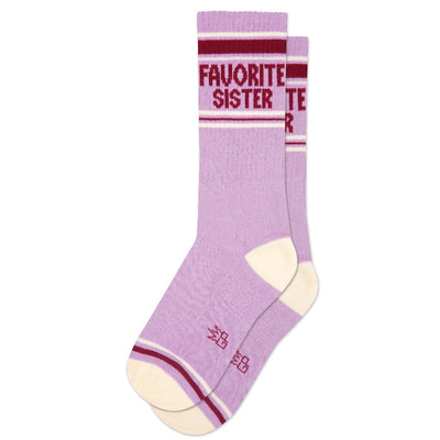 Gumball Poodles Favorite Sister Gym Crew Socks are unisex, made from natural cotton in lavender with cream toes and heels, maroon and white stripes, and FAVORITE SISTER in maroon by the top for comfort and style.