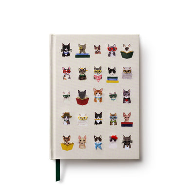 The Studious Cats Embroidered Journal by Rifle Paper Co. features a cream cover with embroidered cats sporting glasses, bows, scarves, and books in five rows, plus a green ribbon bookmark.