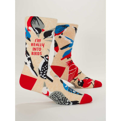 Blue Qs Really Into Birds Mens Socks feature colorful bird illustrations with red toes and heels. One sock has “IM REALLY INTO BIRDS” in red—perfect quirky socks for any bird enthusiast.
