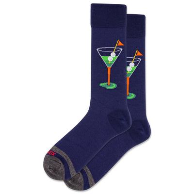 HOTSOX Mens Golf Martini Crew Socks feature navy blue fabric with gray toes and heels, showing a golf tee and ball inside a martini glass. Made from soft cotton for comfort; fits most men’s shoe sizes—perfect for golf and cocktail lovers.