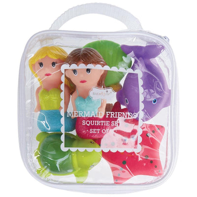 A clear zippered bag from Mud Pie holds the Mermaid Friends Bath Toy Set, featuring colorful bath toys for toddlers: two mermaids, a purple whale, a green turtle, and a red fish.