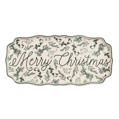 The Mud Pie Merry Christmas Green Toile Tray features scalloped, hand-painted rims, festive holly and pine designs, and elegant script—perfect for in-store holiday shopping. Note: UNAVAILABLE FOR SHIPPING.