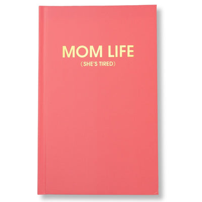 The Chez Gagné Mom Life (shes tired) bright red hardcover journal stands out with its yellow text on a white background, featuring lined heavyweight paper ideal for capturing daily moments.