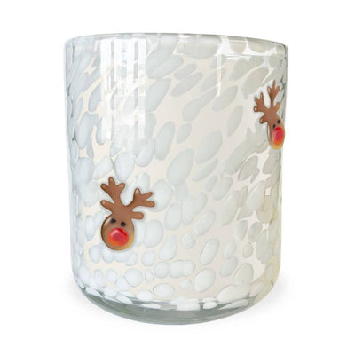 A festive 12 oz Reindeer Cookie Holiday Icon Candle by The SOi Company, featuring a clear glass tumbler with white textured spots and two reindeer faces—perfect for gifting this holiday season.