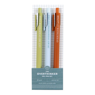 The Overthinker Pen Set by Studio Calico includes three gel pens in green, blue, and orange with witty phrases—an ideal gift for writers who love to jot down every thought.
