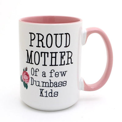 The Lenny Mud Proud Mother Mug features a pink handle and interior, playful PROUD MOTHER of a few Dumbass Kids text, and a small pink rose—ideal as a snarky gift or unique Mother’s Day mug.