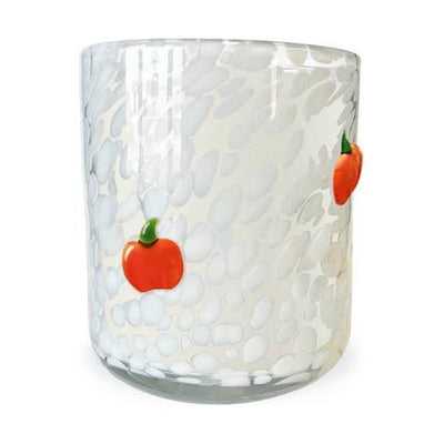 The SOi Company’s Pumpkin Patch 12oz Icon Fall Candle features a clear glass tumbler with an opaque white speckled pattern and two raised red apple accents—perfect for adding autumn charm to any space.