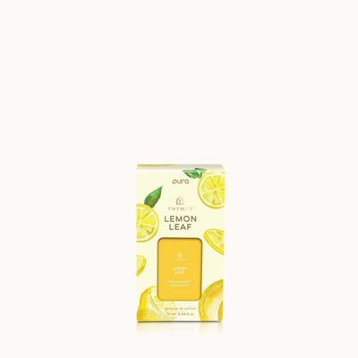 The Lemon Leaf Pura Diffuser Refill by Thymes features delicate lemon and leaf illustrations. The packaging highlights the Thymes and Pura logos on a light, minimalistic background, perfectly capturing its refreshing scent.