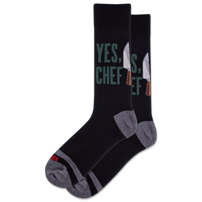 HOTSOX Mens Yes Chef Crew Socks in black and gray cotton, fit mens shoe sizes 6-12.5. Features “YES, CHEF!” text and chefs knives design with a red “ODD SOX” logo on the toe.